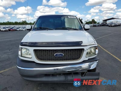 Piąte zdjęcie samochodu w środku: 2002 FORD F150 VIN:1FTRX17L82NB30364 - miniatura
