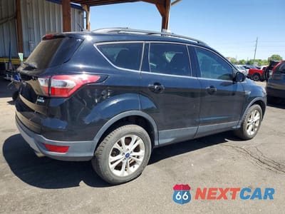 Trzecie zdjęcie samochodu z tyłu: 2017 FORD ESCAPE SE VIN:1FMCU9G99HUB94196 - miniatura