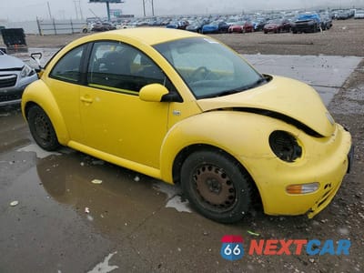 Czwarte zdjęcie samochodu z boku: 2002 VOLKSWAGEN NEW BEETLE GL VIN:3VWBB21CX2M428128 - miniatura