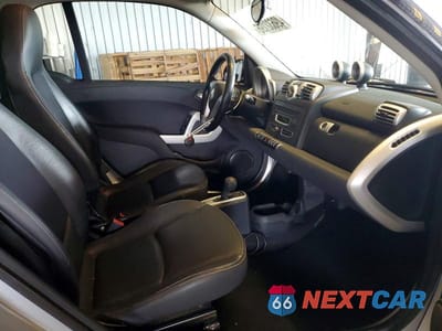 Zdjęcie 10 z 12 samochodu: 2009 SMART FORTWO PURE VIN:WMEEJ31XX9K257332 - miniatura