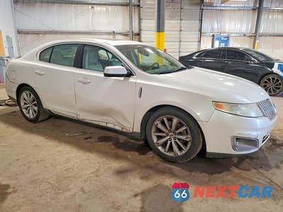 Czwarte zdjęcie samochodu z boku: 2012 LINCOLN MKS VIN:1LNHL9DR1CG806587 - miniatura