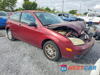 Czwarte zdjęcie samochodu z boku: 2007 FORD FOCUS ZX3 VIN:1FAFP31N07W126177 - miniatura