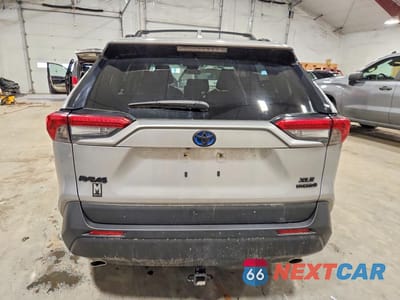 Zdjęcie 6 z 13 samochodu: 2021 TOYOTA RAV4 HYBRID XLE VIN:JTMRWRFV0MD128427 - miniatura