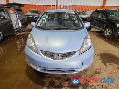 Piąte zdjęcie samochodu w środku: 2009 HONDA FIT LX VIN:JHMGE88509S806726 - miniatura