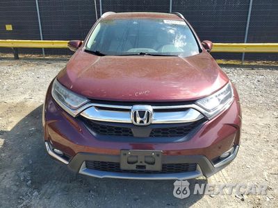 Piąte zdjęcie samochodu w środku: 2017 HONDA CR-V TOURING VIN:2HKRW2H90HH632922 - miniatura