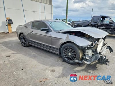 Czwarte zdjęcie samochodu z boku: 2014 FORD MUSTANG VIN:1ZVBP8AM5E5319096 - miniatura
