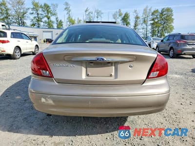 Zdjęcie 6 z 12 samochodu: 2002 FORD TAURUS LX VIN:1FAFP52202G210602 - miniatura
