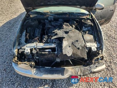 Zdjęcie 11 z 13 samochodu: 1998 BUICK PARK AVENUE VIN:1G4CW52K4W4636750 - miniatura