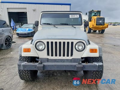 Piąte zdjęcie samochodu w środku: 2005 JEEP WRANGLER X VIN:1J4FA39S35P337557 - miniatura