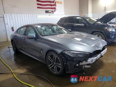 Czwarte zdjęcie samochodu z boku: 2022 BMW 840XI VIN:WBAGV4C05NCH51233 - miniatura