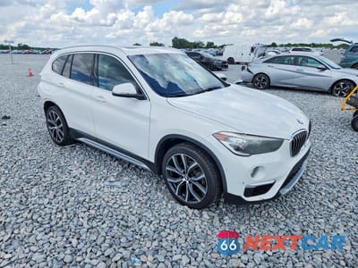 Czwarte zdjęcie samochodu z boku: 2018 BMW X1 SDRIVE28I VIN:WBXHU7C3XJ3H43664 - miniatura
