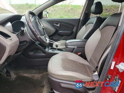 Zdjęcie 7 z 14 samochodu: 2012 HYUNDAI TUCSON GLS VIN:KM8JU3ACXCU443154 - miniatura