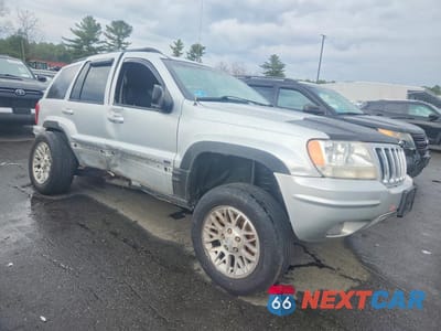 Czwarte zdjęcie samochodu z boku: 2002 JEEP GRAND CHEROKEE LIMITED VIN:1J4GW58S72C327863 - miniatura