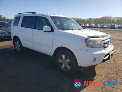 Czwarte zdjęcie samochodu z boku: 2011 HONDA PILOT EXLN VIN:5FNYF4H7XBB069728 - miniatura