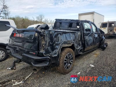 Trzecie zdjęcie samochodu z tyłu: 2022 GMC SIERRA K2500 AT4 VIN:1GT49PEY8NF362483 - miniatura