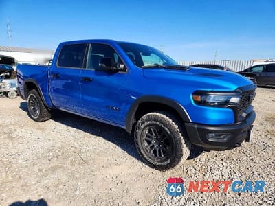 Czwarte zdjęcie samochodu z boku: 2025 RAM 1500 REBEL VIN:1C6SRFLP6SN728106 - miniatura