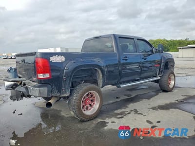 Trzecie zdjęcie samochodu z tyłu: 2012 GMC SIERRA K2500 SLT VIN:1GT121E88CF138423 - miniatura