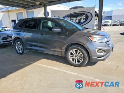 Czwarte zdjęcie samochodu z boku: 2016 FORD EDGE SEL VIN:2FMPK3J98GBC12107 - miniatura