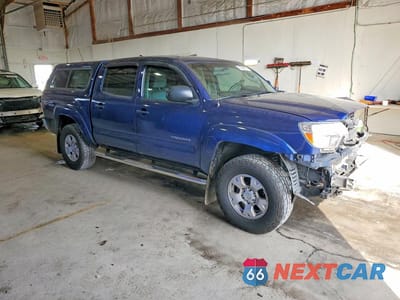 Czwarte zdjęcie samochodu z boku: 2014 TOYOTA TACOMA DOUBLE CAB VIN:3TMLU4EN3EM135927 - miniatura