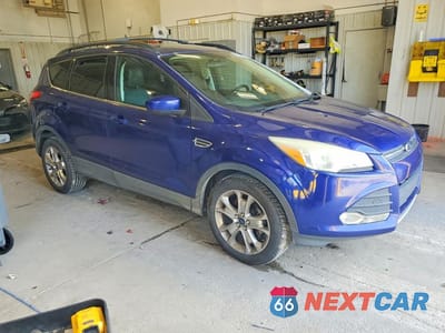 Czwarte zdjęcie samochodu z boku: 2014 FORD ESCAPE SE VIN:1FMCU0GX1EUB78354 - miniatura