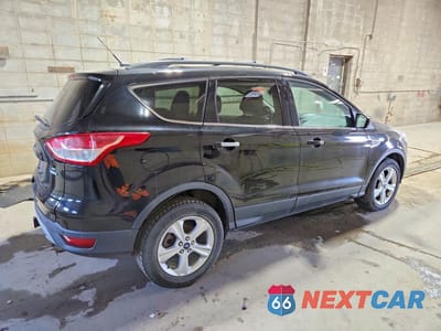 Trzecie zdjęcie samochodu z tyłu: 2016 FORD ESCAPE SE VIN:1FMCU9G95GUC47121 - miniatura