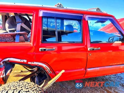 Zdjęcie 10 z 13 samochodu: 1998 JEEP CHEROKEE SPORT VIN:1J4FT68S2WL109605 - miniatura