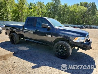 Czwarte zdjęcie samochodu z boku: 2017 RAM 1500 SLT VIN:1C6RR7GT6HS521317 - miniatura