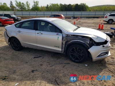 Czwarte zdjęcie samochodu z boku: 2018 FORD FUSION SE HYBRID VIN:3FA6P0LU9JR137532 - miniatura