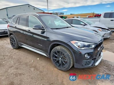 Czwarte zdjęcie samochodu z boku: 2017 BMW X1 XDRIVE28I VIN:WBXHT3C32H5F69762 - miniatura