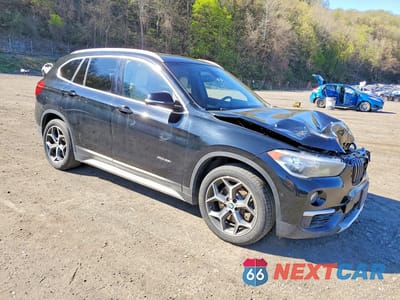 Czwarte zdjęcie samochodu z boku: 2018 BMW X1 XDRIVE28I VIN:WBXHT3Z33J4A66194 - miniatura