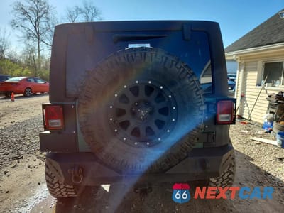 Zdjęcie 6 z 12 samochodu: 2014 JEEP WRANGLER UNLIMITED SAHARA VIN:1C4HJWEG8EL117971 - miniatura