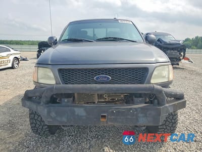 Piąte zdjęcie samochodu w środku: 2002 FORD F150 VIN:1FTRX18L12NA53383 - miniatura