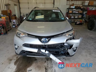 Piąte zdjęcie samochodu w środku: 2016 TOYOTA RAV4 HV LIMITED VIN:JTMDJREV2GD029025 - miniatura