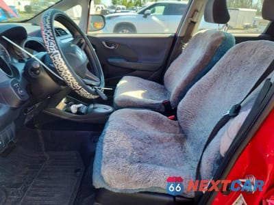 Zdjęcie 7 z 12 samochodu: 2009 HONDA FIT VIN:JHMGE88239S031067 - miniatura