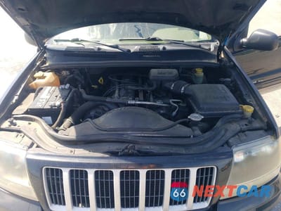 Zdjęcie 12 z 13 samochodu: 2004 JEEP GRAND CHEROKEE LAREDO VIN:1J4GX48S94C132700 - miniatura