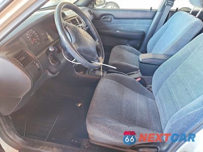 Zdjęcie 7 z 12 samochodu: 1995 TOYOTA COROLLA DX VIN:1NXAE09B0SZ312417 - miniatura