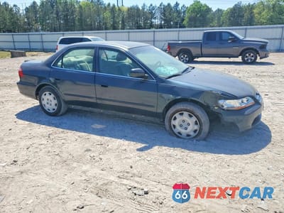 Czwarte zdjęcie samochodu z boku: 2000 HONDA ACCORD LX VIN:1HGCG6652YA021177 - miniatura