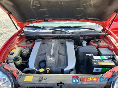 Zdjęcie 12 z 13 samochodu: 2005 HYUNDAI SANTA FE GLS VIN:KM8SC73E35U862902 - miniatura