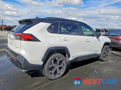 Trzecie zdjęcie samochodu z tyłu: 2024 TOYOTA RAV4 PRIME XSE VIN:JTMEB3FV2RD208679 - miniatura