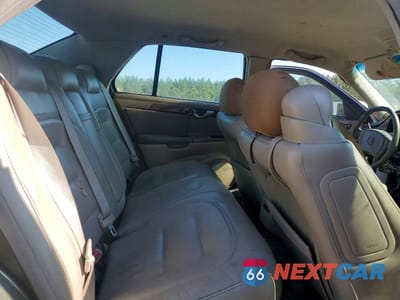 Zdjęcie 10 z 12 samochodu: 2003 CADILLAC DEVILLE VIN:1G6KD54Y03U120679 - miniatura