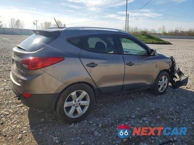 Trzecie zdjęcie samochodu z tyłu: 2013 HYUNDAI TUCSON GLS VIN:KM8JUCAC7DU566749 - miniatura