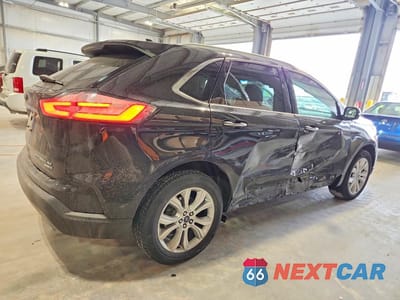 Trzecie zdjęcie samochodu z tyłu: 2019 FORD EDGE TITANIUM VIN:2FMPK4K94KBC02736 - miniatura