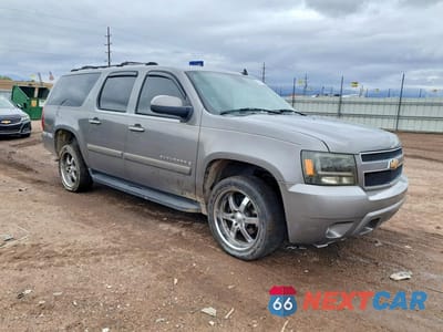 Czwarte zdjęcie samochodu z boku: 2007 CHEVROLET SUBURBAN K1500 VIN:1GNFK16337J202077 - miniatura