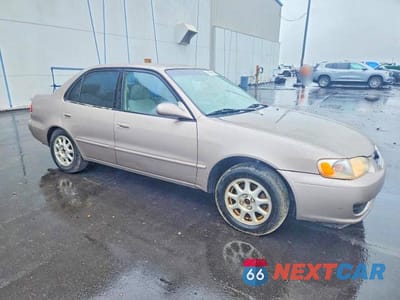 Czwarte zdjęcie samochodu z boku: 2001 TOYOTA COROLLA LE VIN:1NXBR12E51Z492401 - miniatura