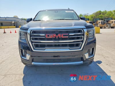 Piąte zdjęcie samochodu w środku: 2021 GMC YUKON SLT VIN:1GKS1BKD5MR117631 - miniatura