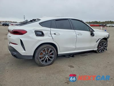 Trzecie zdjęcie samochodu z tyłu: 2021 BMW X6 M50I VIN:5UXCY8C02M9H68663 - miniatura