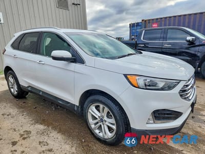 Czwarte zdjęcie samochodu z boku: 2019 FORD EDGE SEL VIN:2FMPK4J91KBC00279 - miniatura