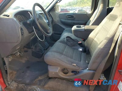 Zdjęcie 7 z 12 samochodu: 2003 FORD F150 VIN:2FTRF08213CA15132 - miniatura