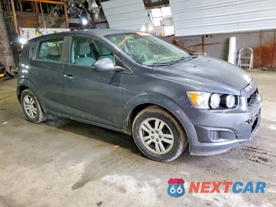Czwarte zdjęcie samochodu z boku: 2012 CHEVROLET SONIC LS VIN:1G1JB6SH3C4189141 - miniatura
