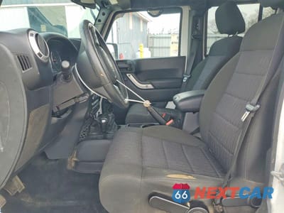 Zdjęcie 7 z 12 samochodu: 2012 JEEP WRANGLER UNLIMITED SAHARA VIN:1C4BJWEG3CL277680 - miniatura
